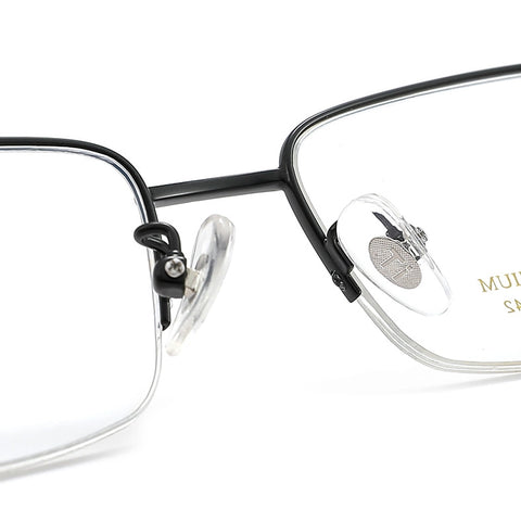 Close-up of a pair of black pure titanium half frame glasses for men from Verhalo Vision with clear silicone nose pads on a white background.