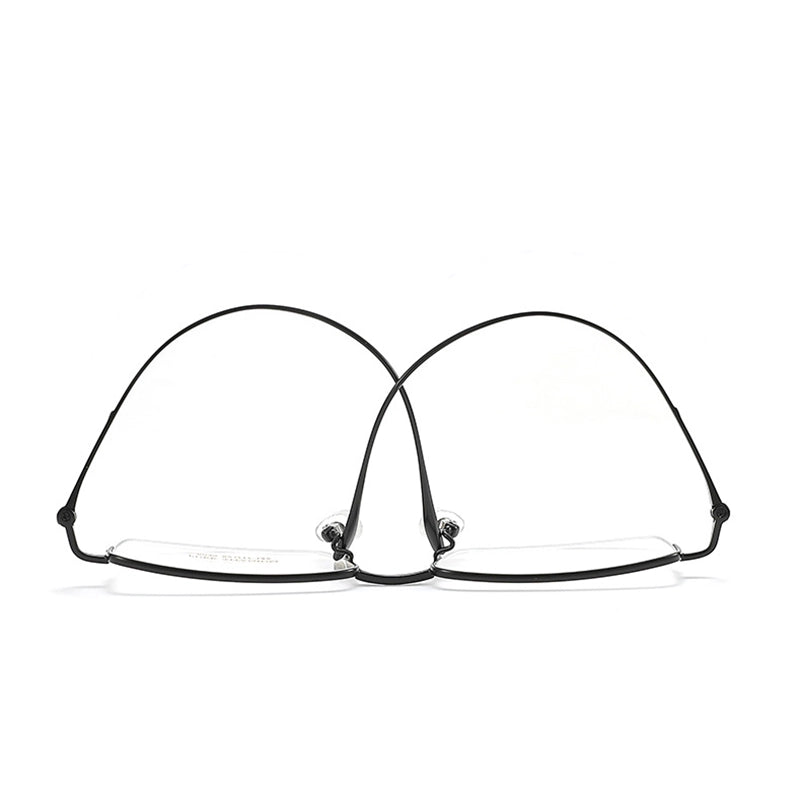 Thin black silver pure titanium half frame glasses for men from Verhalo Vision with clear lenses and adjustable temple arms, shown from the front on a white background.