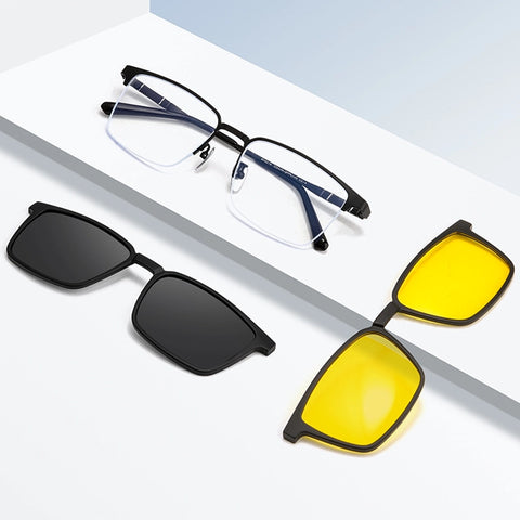 Three pairs of black pure titanium semi-rimless magnetic glasses frames from Verhalo Vision displayed on a clean white geometric surface: one pair with clear lenses and dark blue temples, one pair with black lenses, and one pair with yellow-tinted lenses.