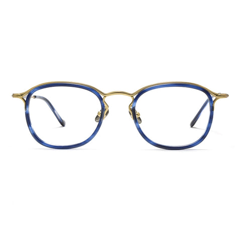 Round Vintage Designer Eyelasses from Verhalo Vision with a gold titanium frame and blue acetate rims, shown from the front on a white background.