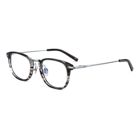 A pair of designer titanium eyeglasses with a dark gray and black marbled acetate front frame, silver metal bridge and temples, and clear lenses, shown on a plain white background.