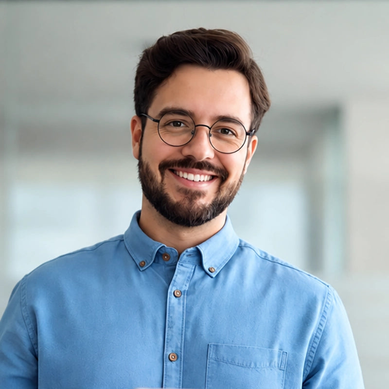 A man wearing Titanium Black Round Glasses from Verhalo Vision